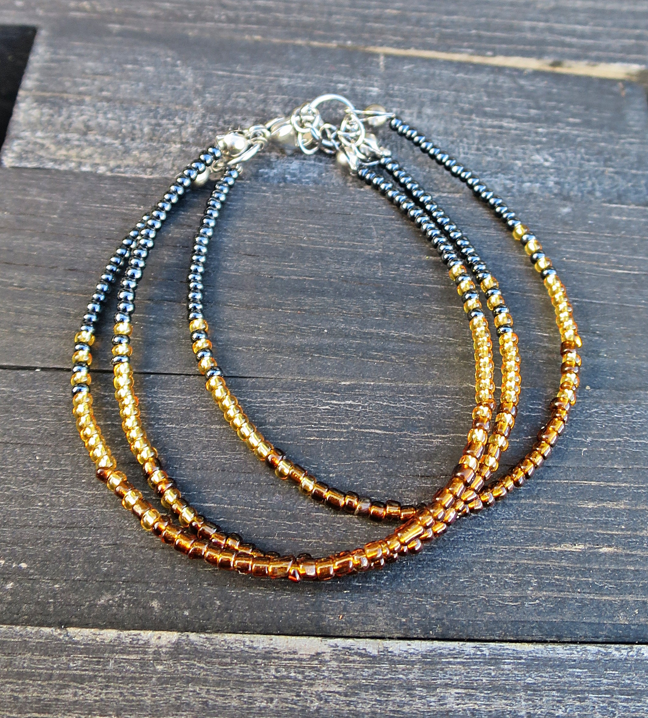 Mermaid - Armbånd i gull og blåsort