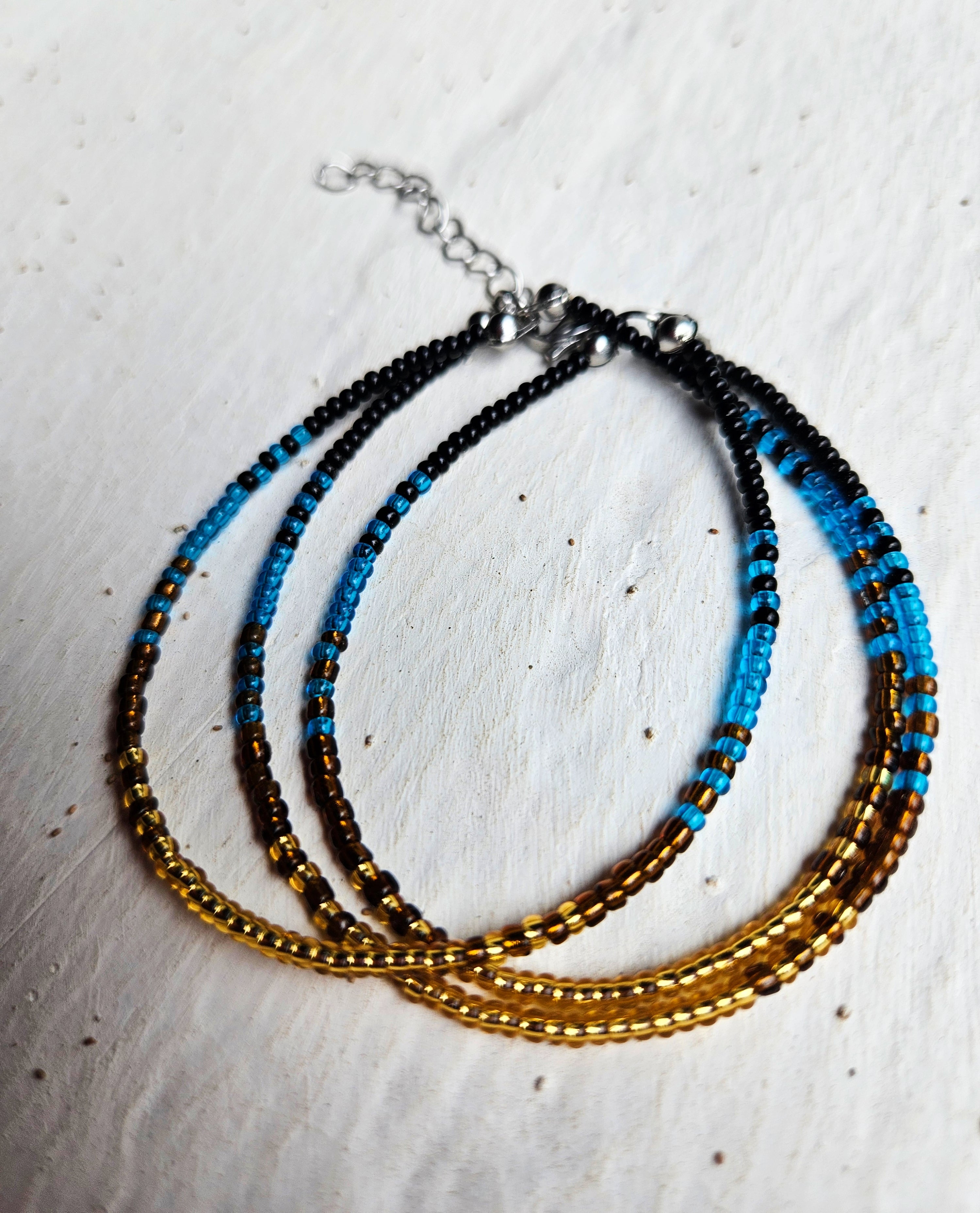 Mermaid - Armbånd i turkis, gull og sort