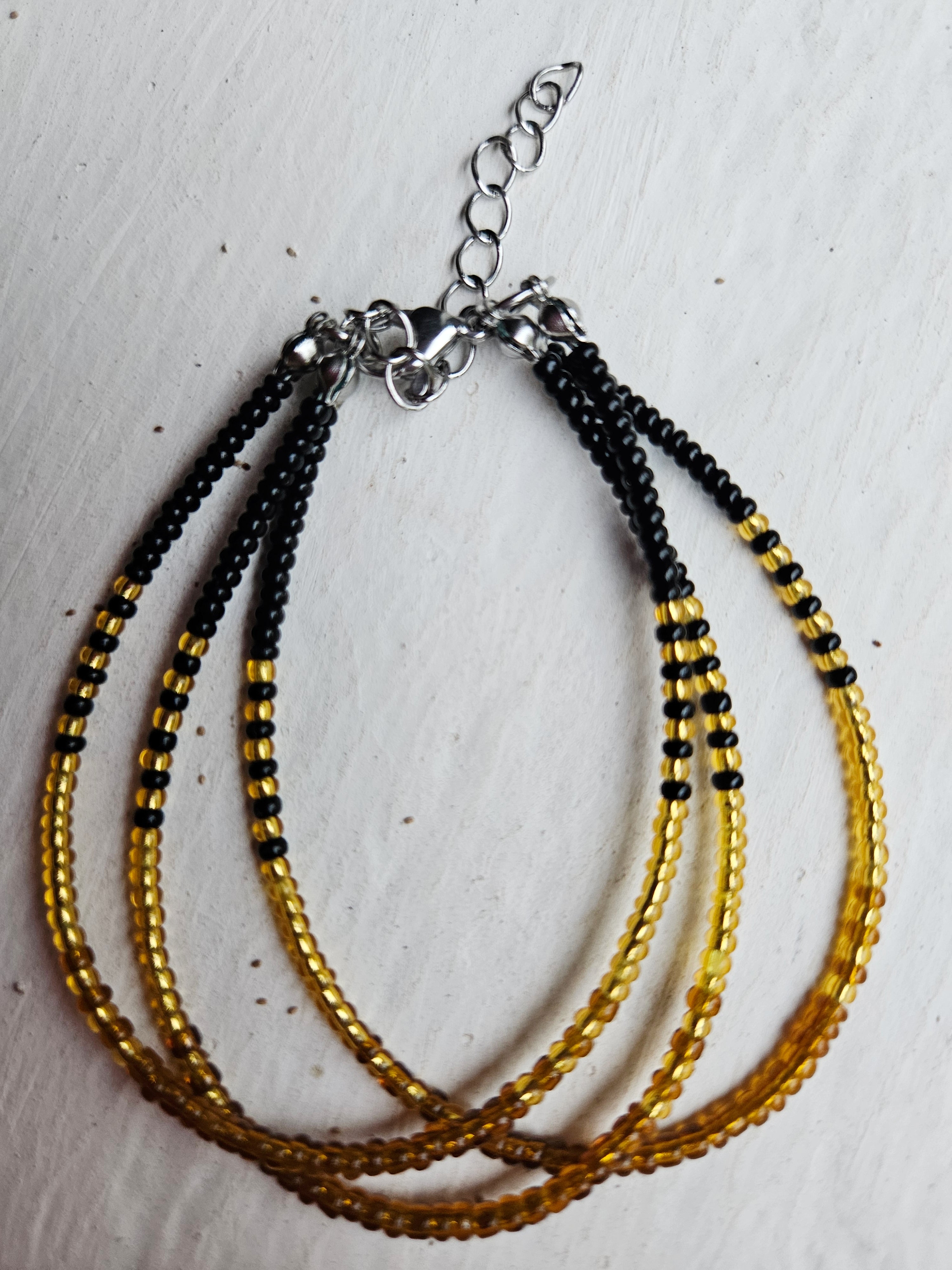 Mermaid - Armbånd i gull og sort (animal)